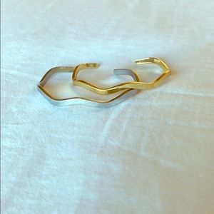 Silver and gold bracelets